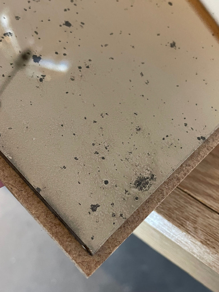Foxed on Bronze Sample
