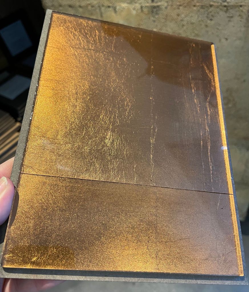 Morwellham on Bronze Tinted Glass Sample