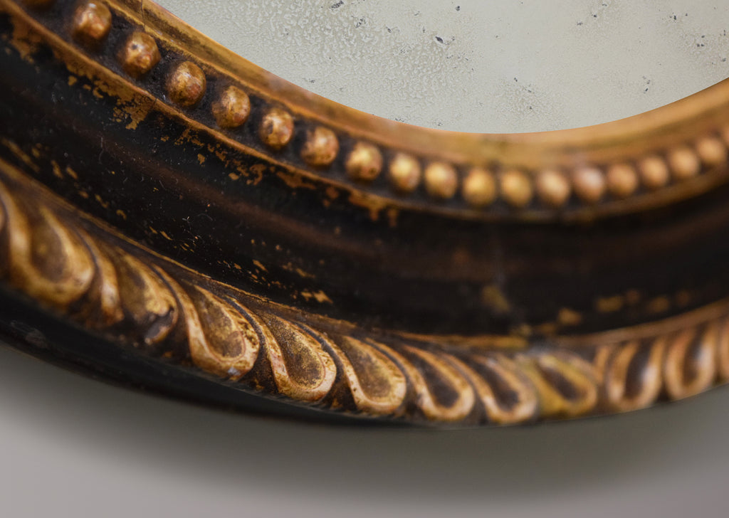 Carved Ebonised & Gilt Mirror