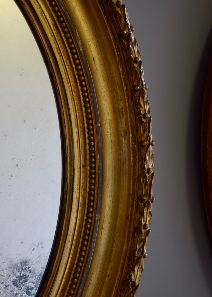 Pair of Distressed Water Gilt Oval Mirrors - SOLD