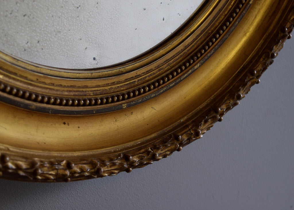 Pair of Distressed Water Gilt Oval Mirrors - SOLD