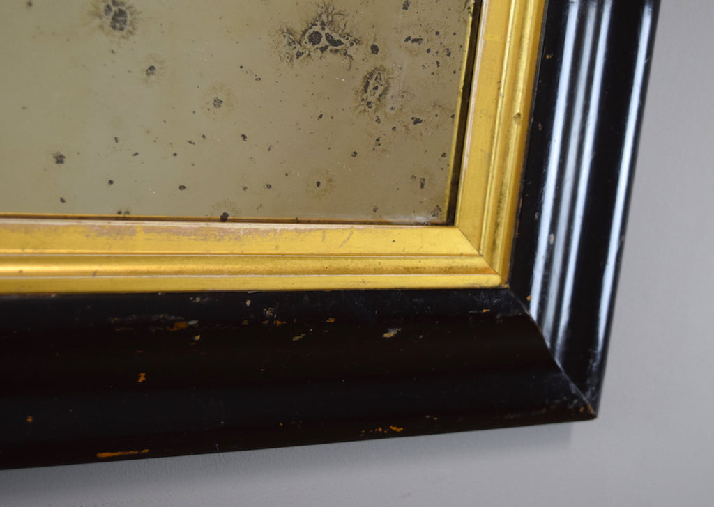 Early 19th Century Ebonised Mirror with Gold Gilt Slip