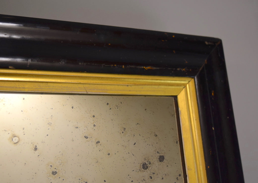 Early 19th Century Ebonised Mirror with Gold Gilt Slip