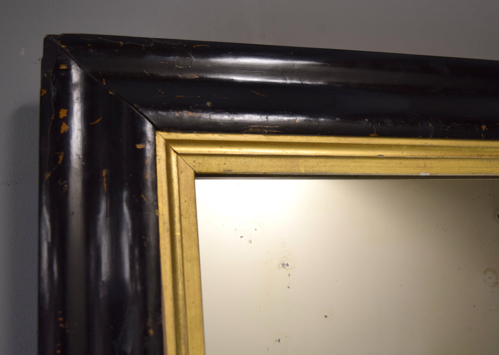 Early 19th Century Ebonised Mirror with Gold Gilt Slip