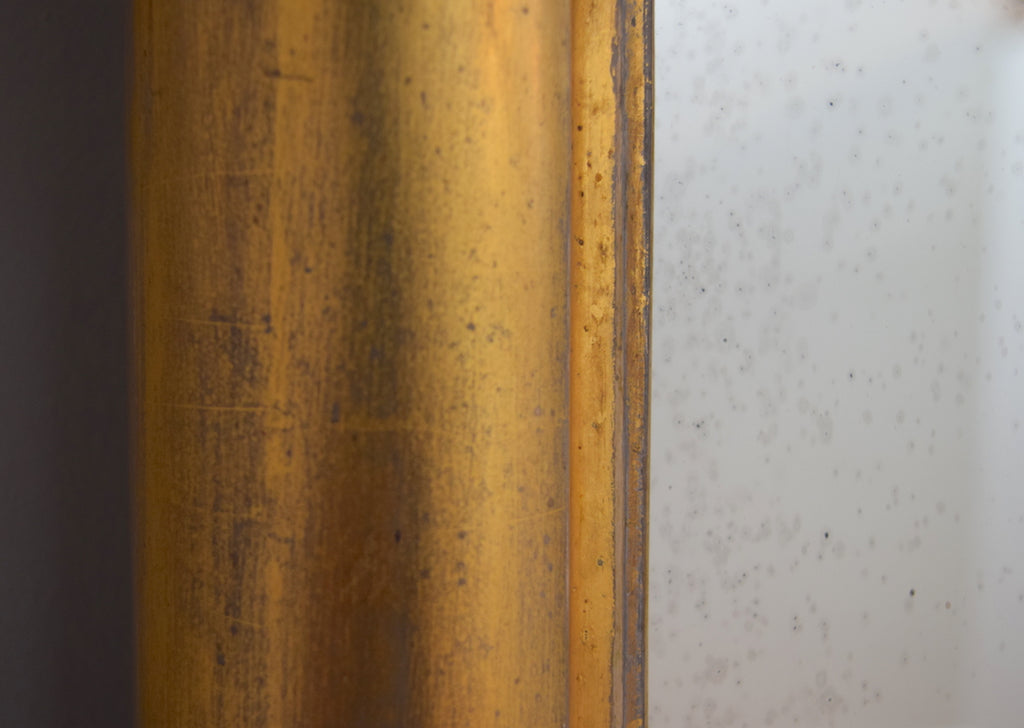 Early 19th Century Regency Gilt Mirror on Ebonised Plinth
