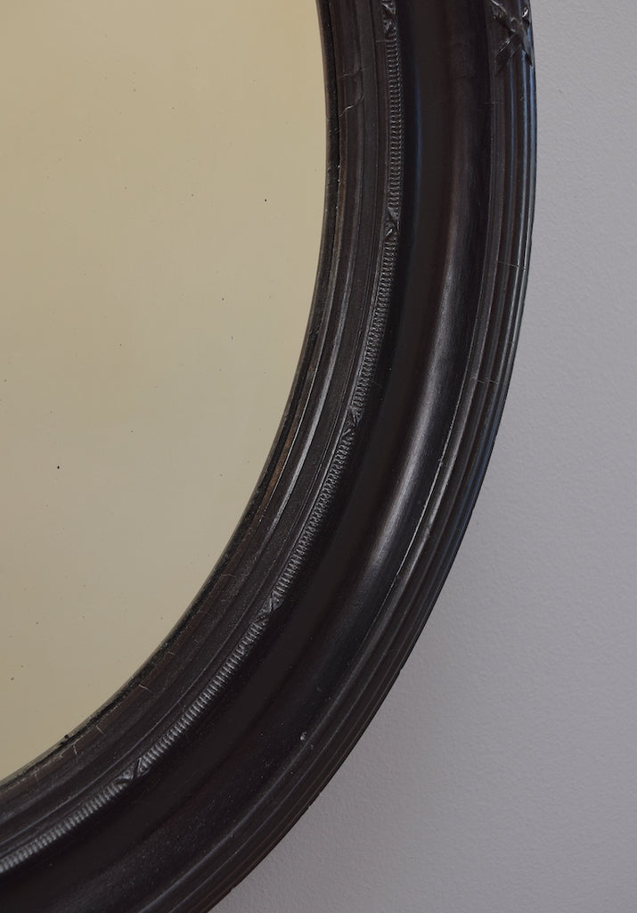 Ebonised Oval Mirror