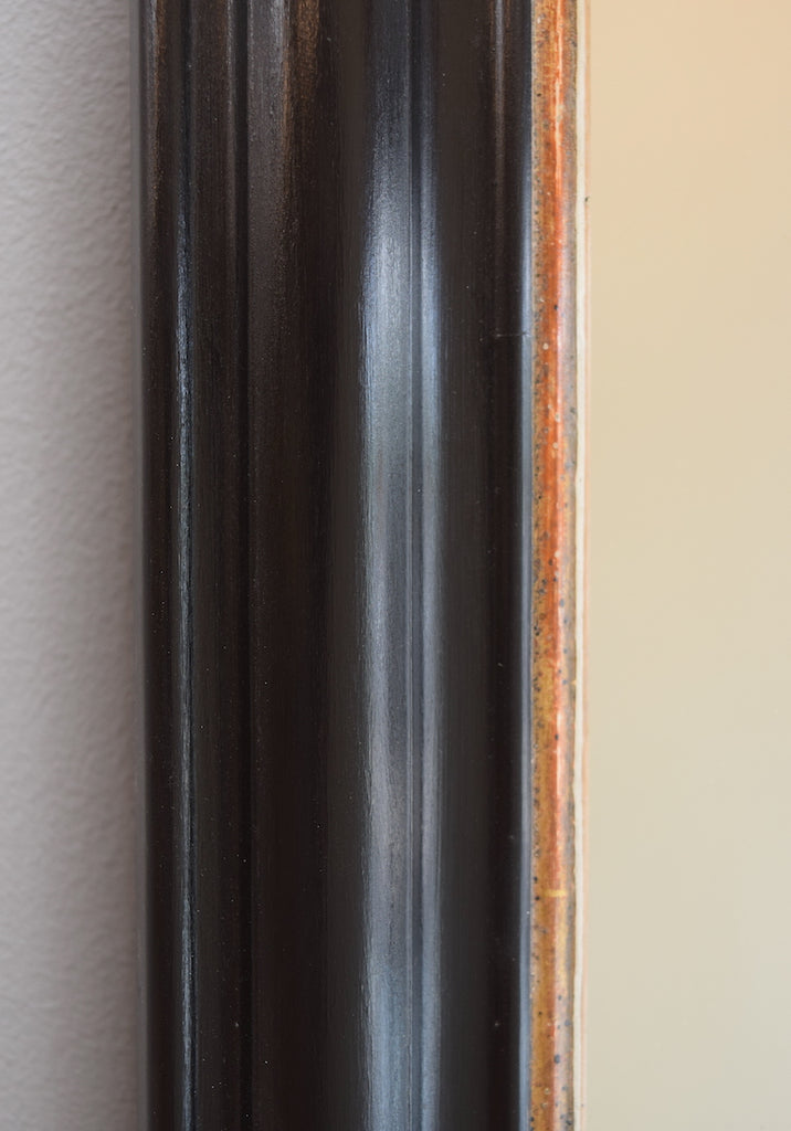 Gilt and Ebonised Mirror