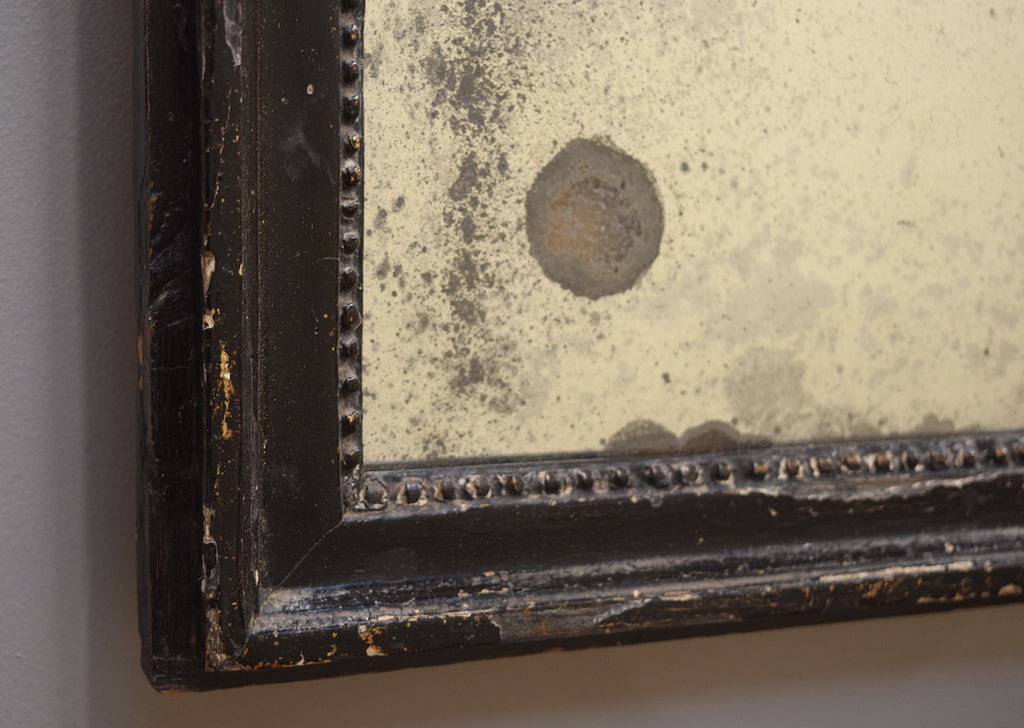 Carved Ebonised Mirror