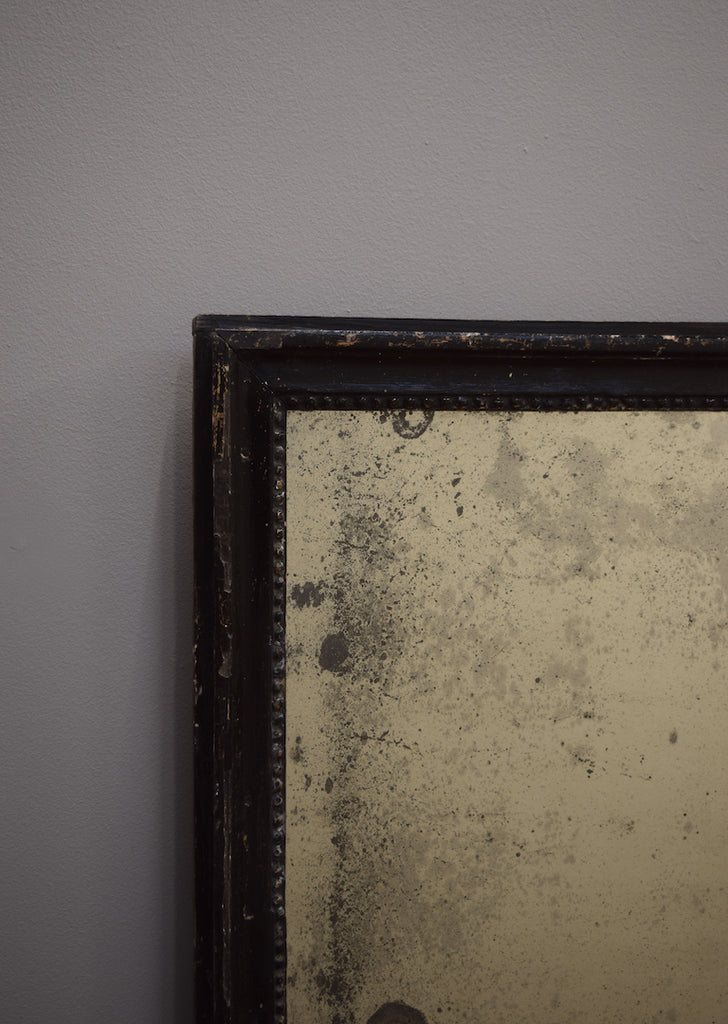 Carved Ebonised Mirror