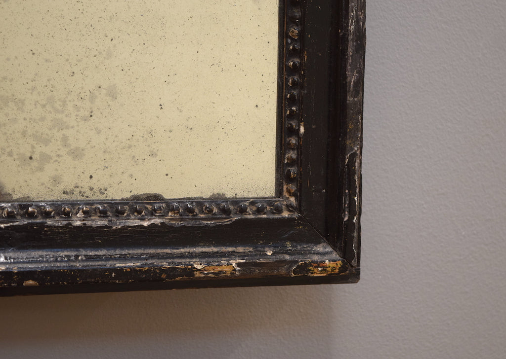 Carved Ebonised Mirror