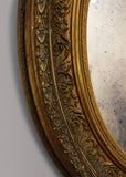 Pair of Gilt Oval Mirrors