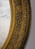 Pair of Gilt Oval Mirrors