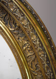 Pair of Gilt Oval Mirrors