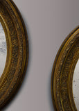 Pair of Gilt Oval Mirrors