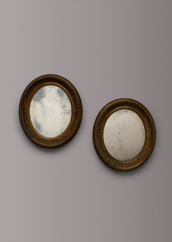 Pair of Gilt Oval Mirrors