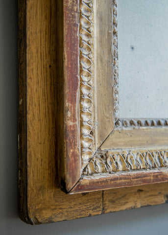Closeup of French Carved & Giltwood Antique Mirror | Rough Old Glass