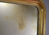 Late 19th Century French Gilt Mirror with Warm Red Bole Under