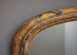 Mid 19th Century English Distressed Gilt Overmantel Mirror