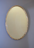 Oval Faux Marble Mirror