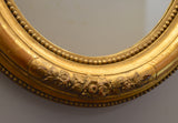 Pair of Oval French Gilt Mirrors