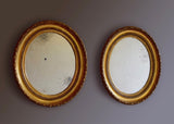Pair of Distressed Water Gilt Oval Mirrors - SOLD